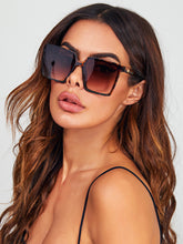 This pair of leopard-print sunglasses combines stylish design with practical protection by fashioncafee.com