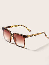 This pair of leopard-print sunglasses combines stylish design with practical protection by fashioncafee.com