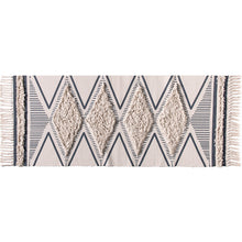 Cotton bedside blanket in front of hand-washing table by Wiio