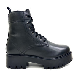 Mid-1970's Fashion Alice Black Heeled Combat Women's Boots by oobash / Buddify