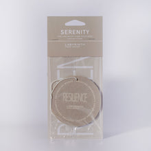Serenity candle is filled in a beautiful, custom glass vessel with the word by Labyrinth Made Goods