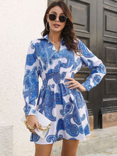 Paisley Print Johnny Collar Smocked Dress by Trendsi