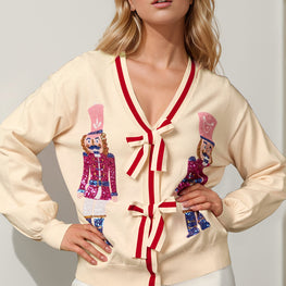 Double Take Full Size Nutcracker Sequin Bow Decor Cardigan by Trendsi