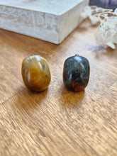 Small Crystal skull / Tiger eye / Bloodstone by Universal Fate / Buddify