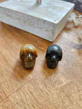 Small Crystal skull / Tiger eye / Bloodstone by Universal Fate / Buddify