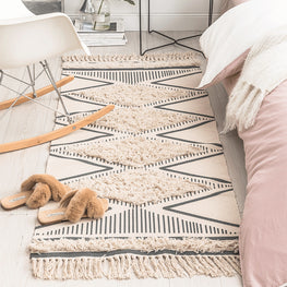 Cotton bedside blanket in front of hand-washing table