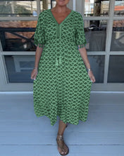 Casual V-neck dress by Trendsi