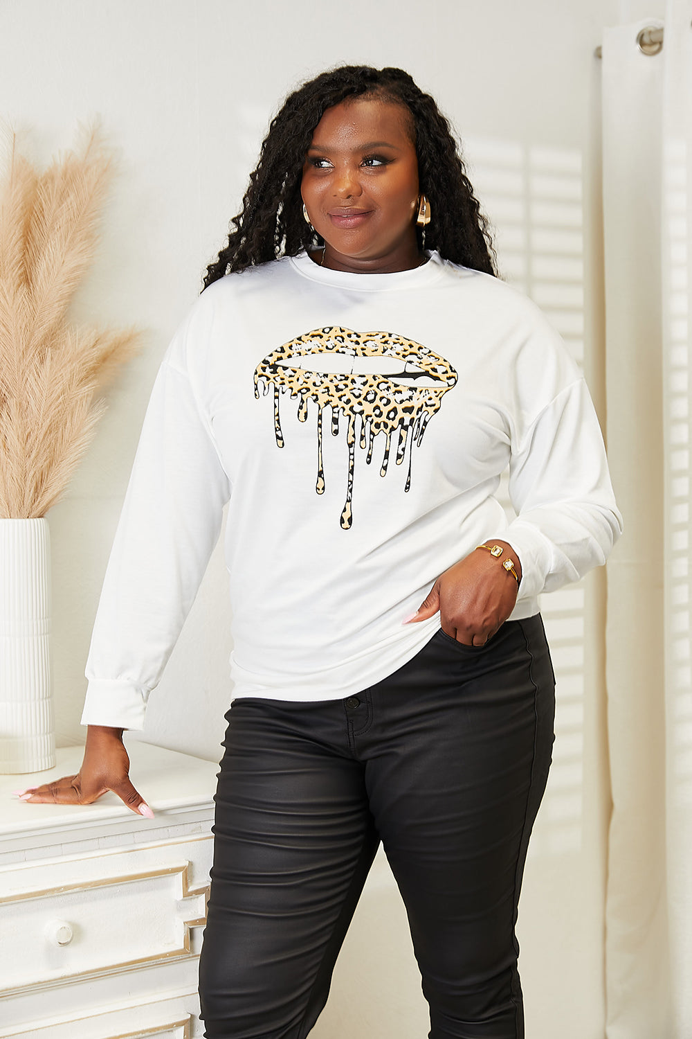 Double Take Graphic Dropped Shoulder Round Neck Sweatshirt by Trendsi
